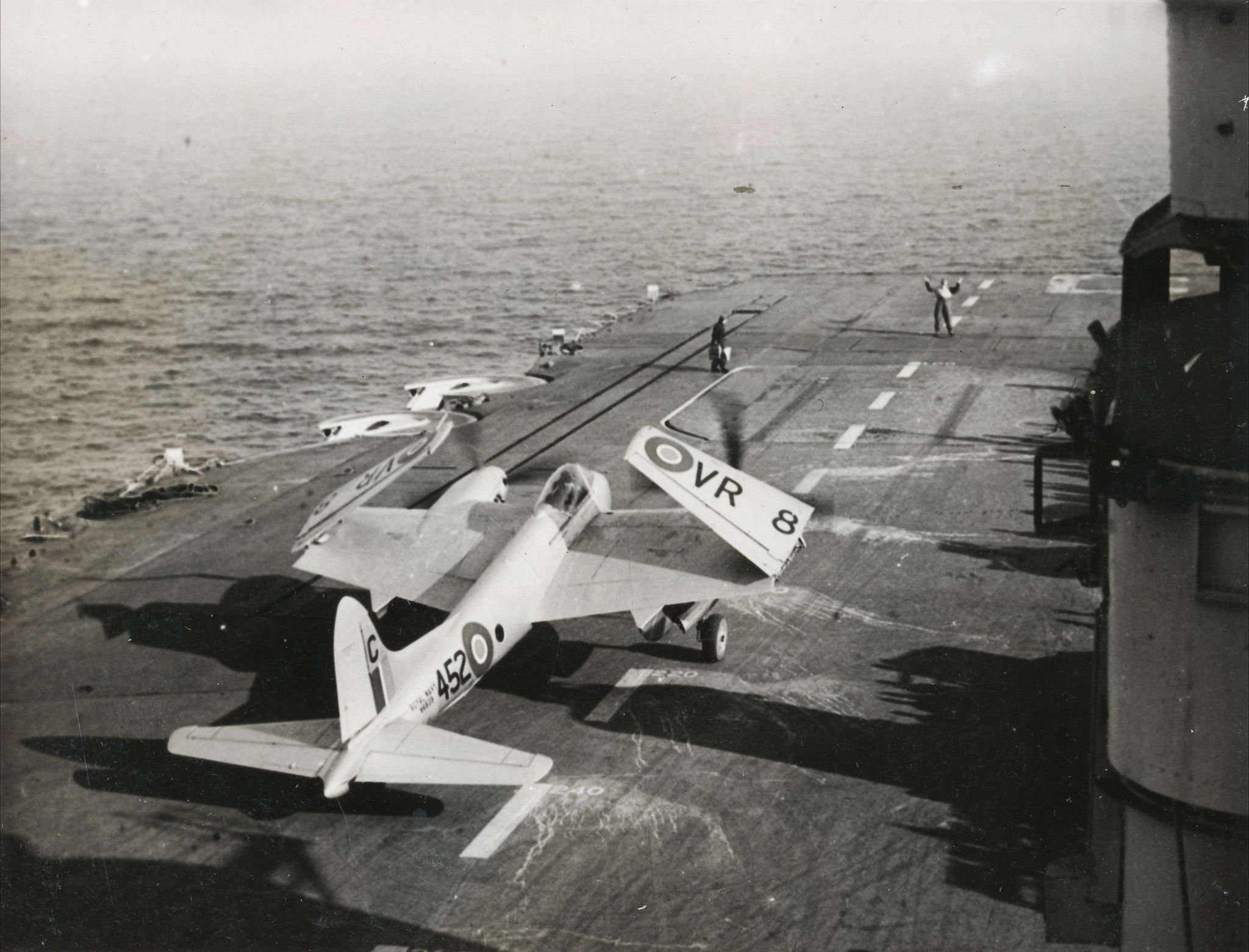  Mosquito landed on aircraft carrier. Wings folded 4 of 5 